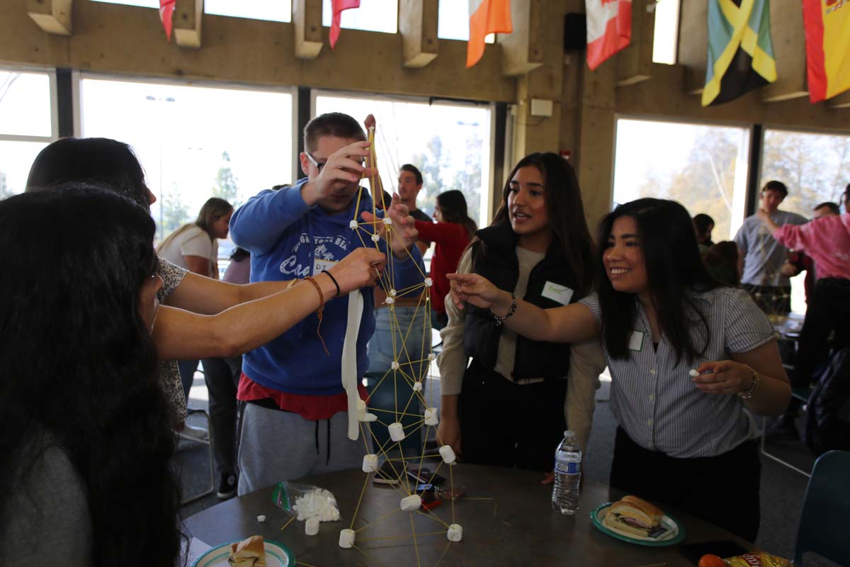 People enjoying the Honors Meet and Greet