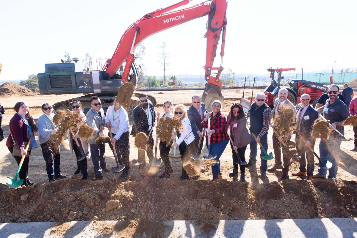 People enjoying the groundbreaking ceremony