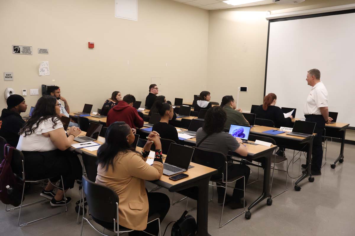 People enjoying the Confire Pioneering Partnership for EMT Training and Employment event.