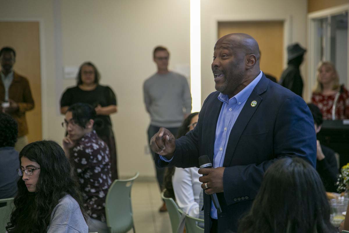 Students celebrate making deans list at event.