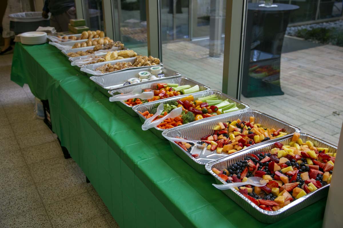 Students celebrate making deans list at event.