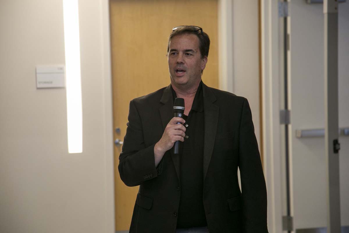 Students celebrate making deans list at event.