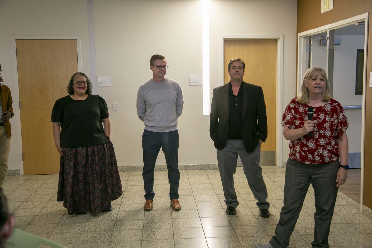 Students celebrate making deans list at event.