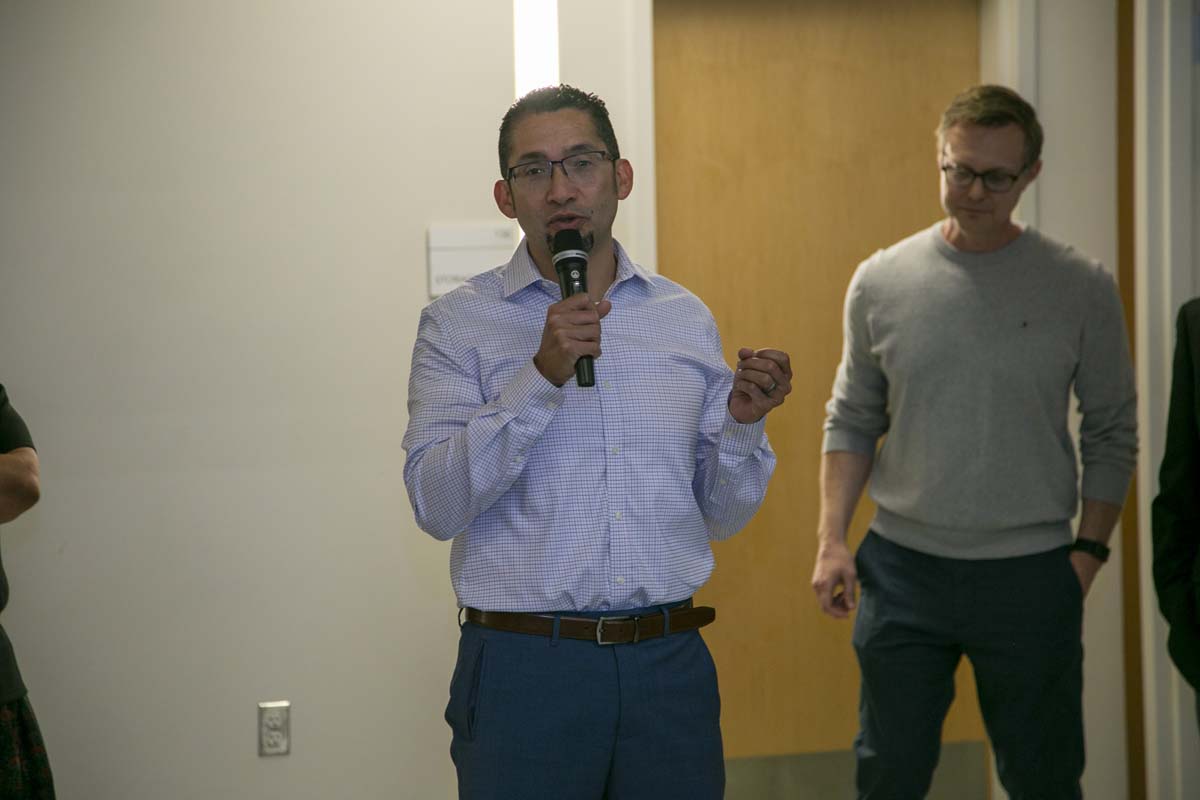 Students celebrate making deans list at event.