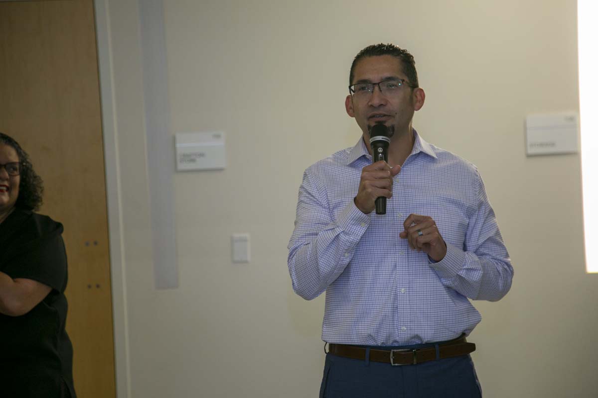 Students celebrate making deans list at event.