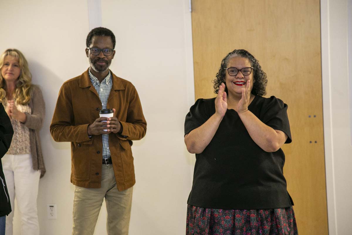 Students celebrate making deans list at event.