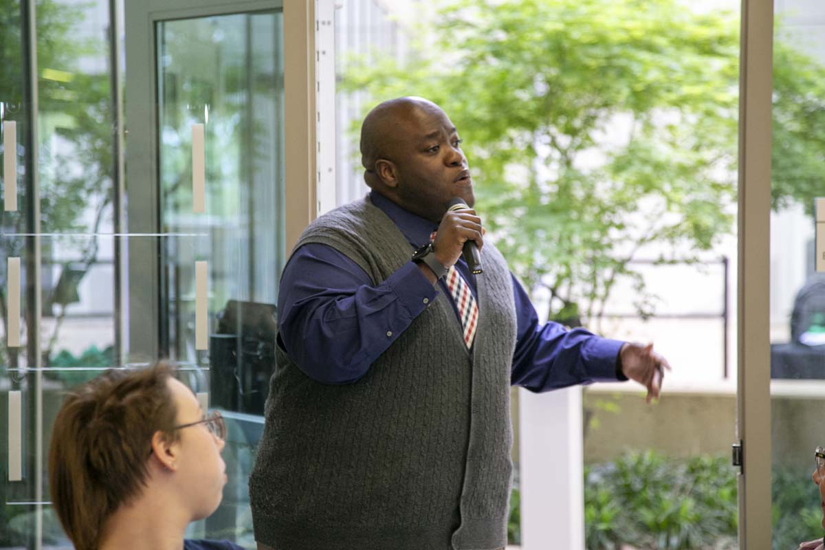 Students celebrate making deans list at event.