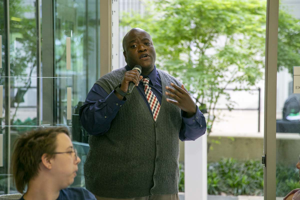 Students celebrate making deans list at event.