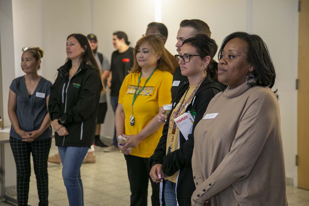 Students celebrate making deans list at event.