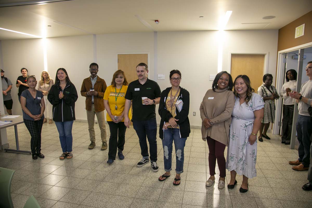 Students celebrate making deans list at event.