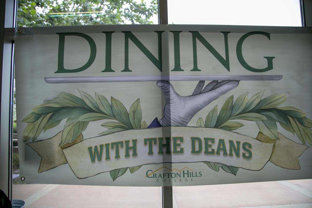 Students celebrate making deans list at event.