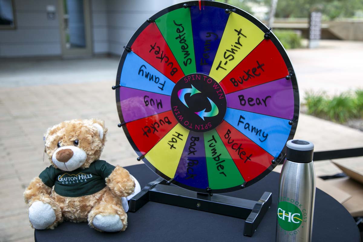 Students celebrate making deans list at event.