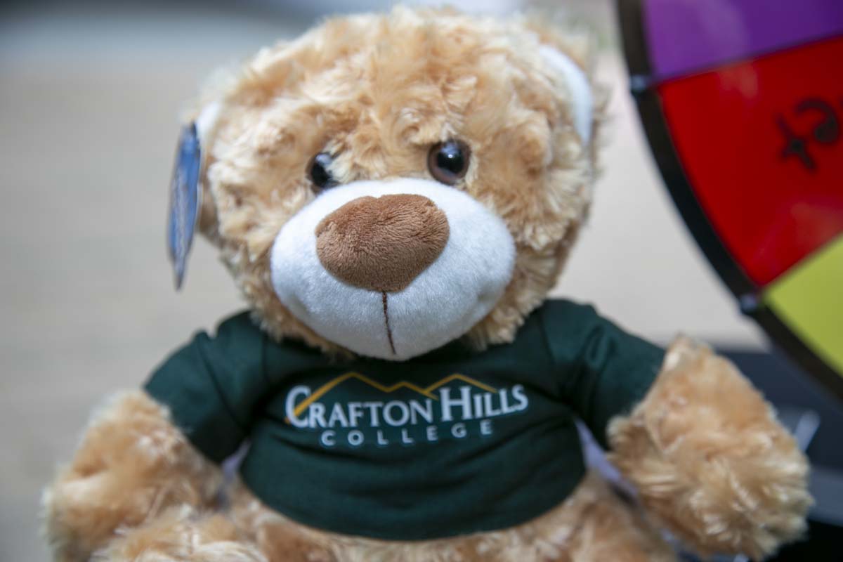 Students celebrate making deans list at event.