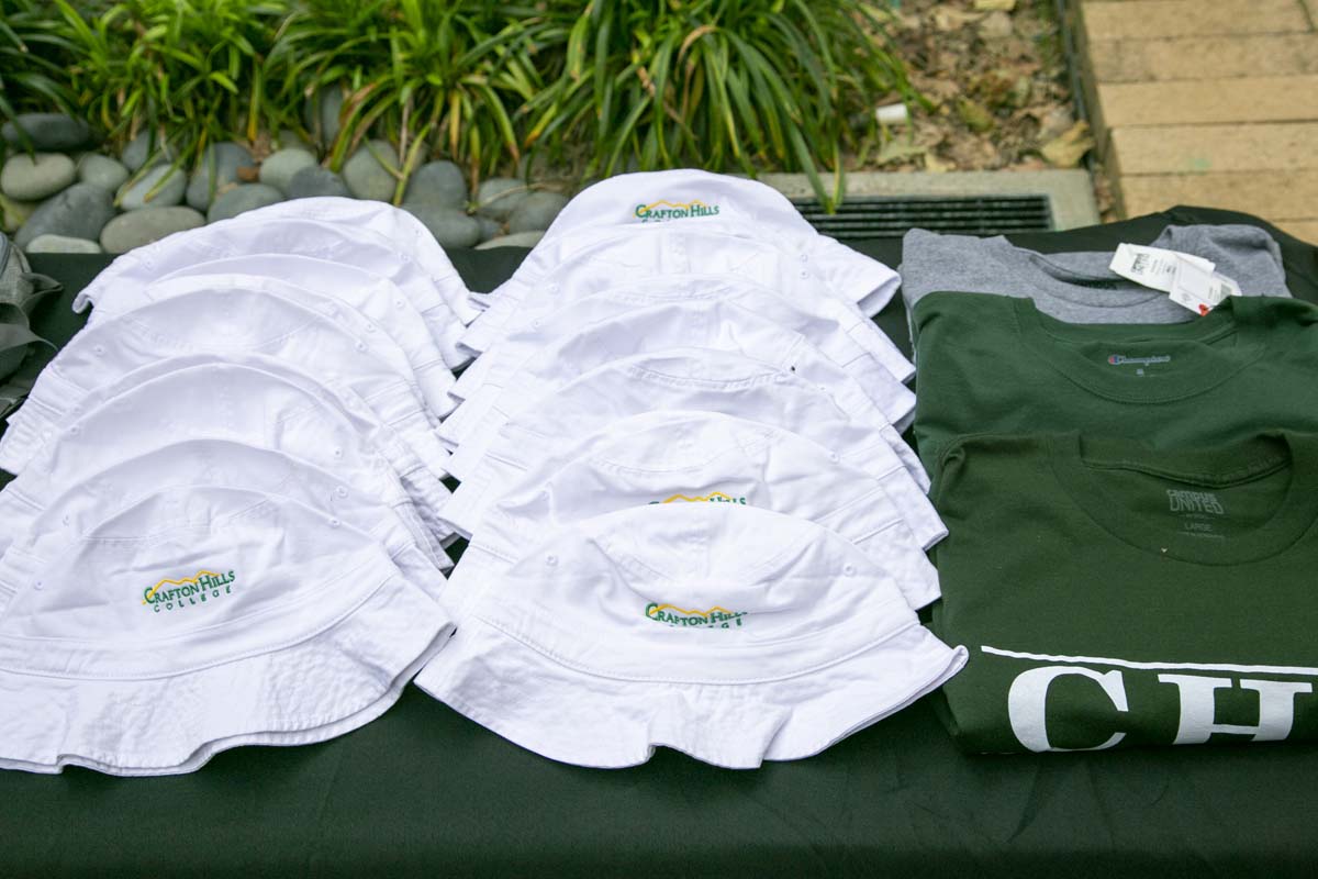 Students celebrate making deans list at event.