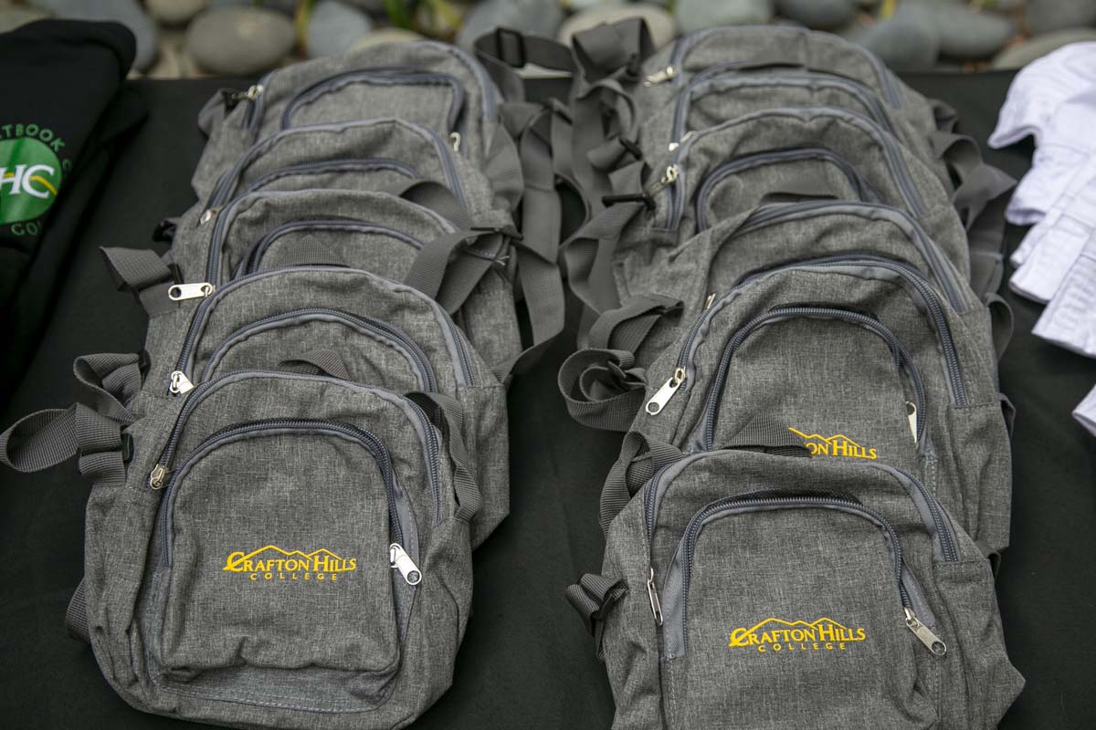 Students celebrate making deans list at event.