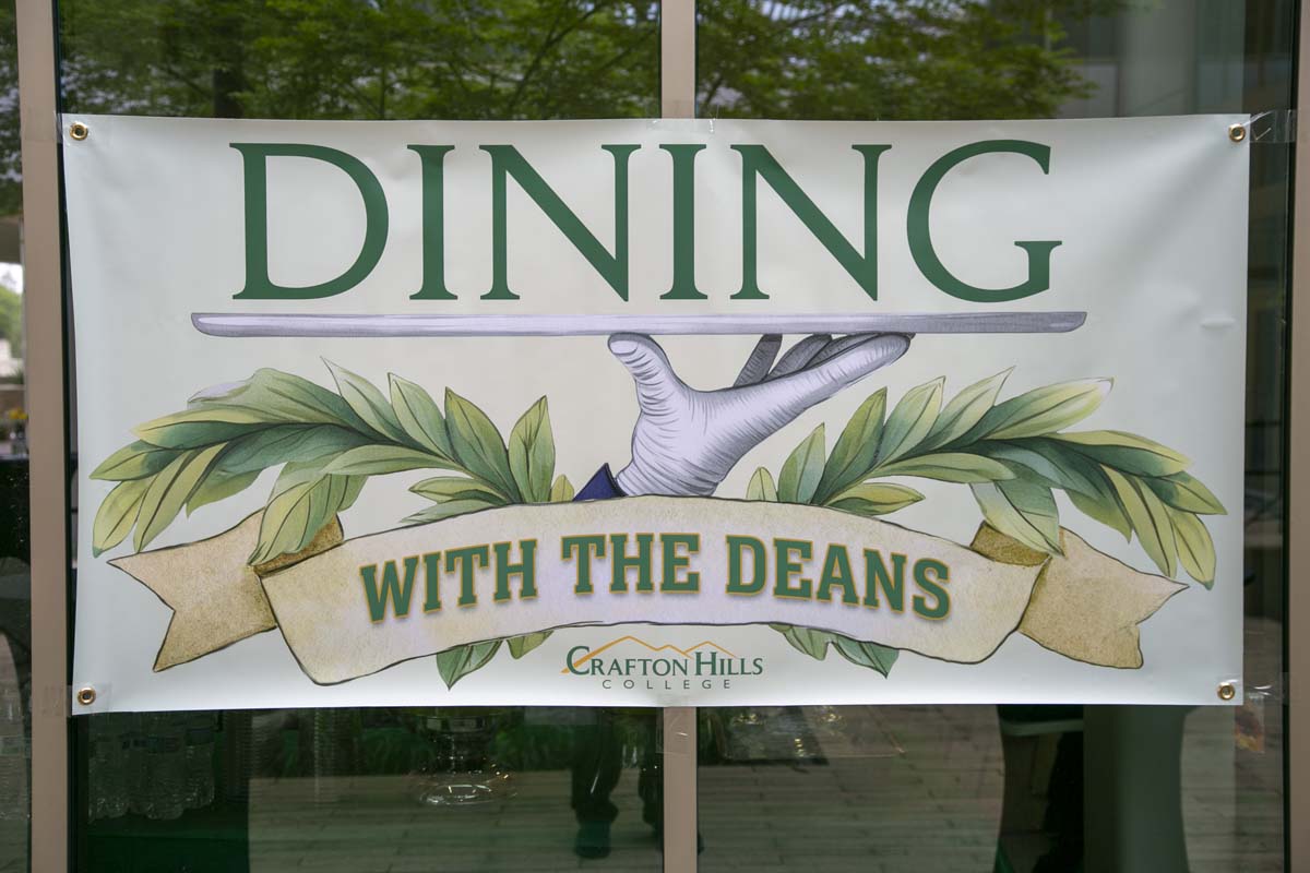 Students celebrate making deans list at event.