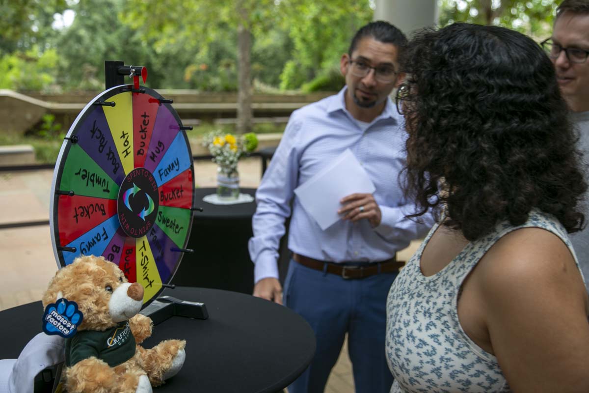 Students celebrate making deans list at event.