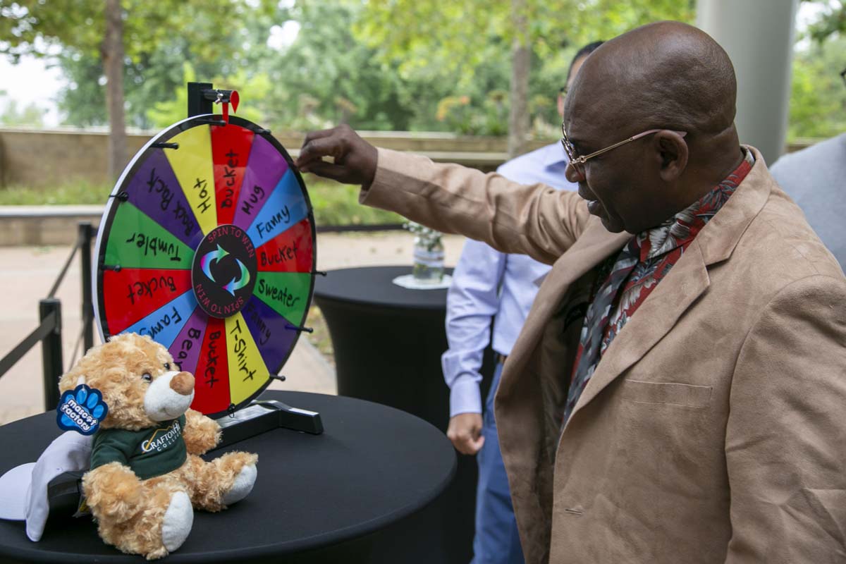 Students celebrate making deans list at event.