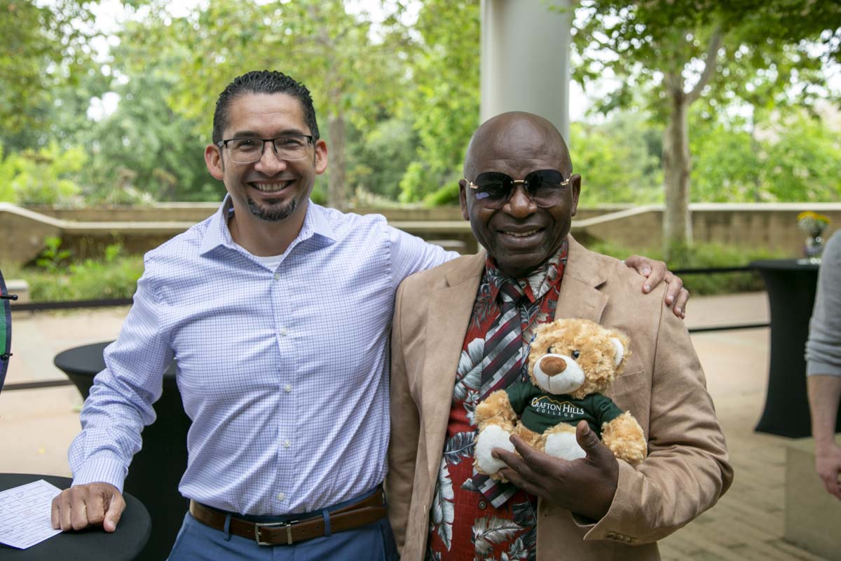 Students celebrate making deans list at event.