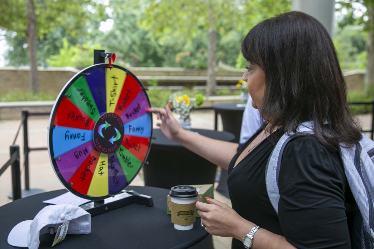 Students celebrate making deans list at event.