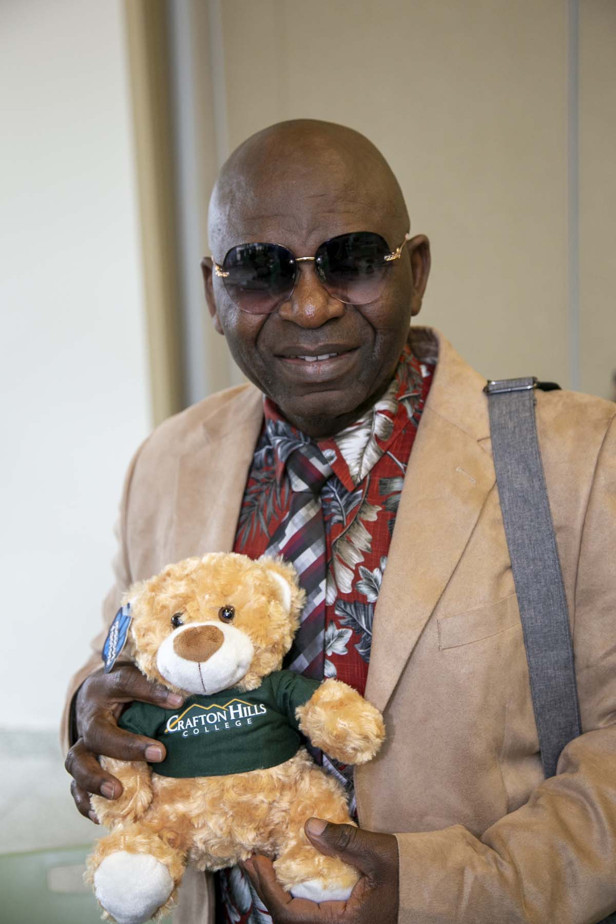 Students celebrate making deans list at event.