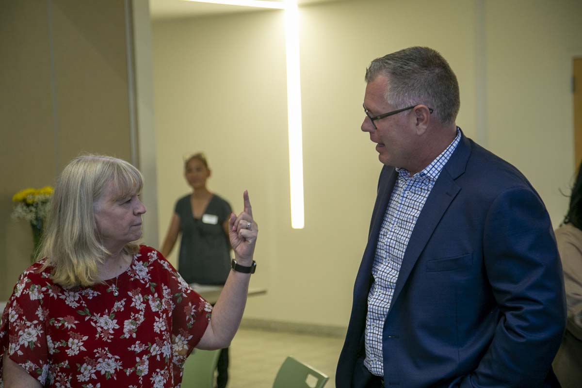 Students celebrate making deans list at event.