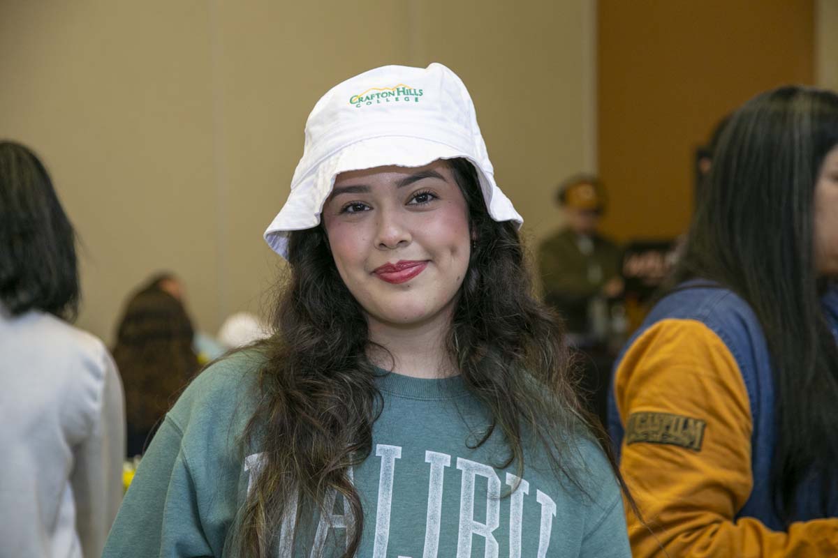 Students celebrate making deans list at event.