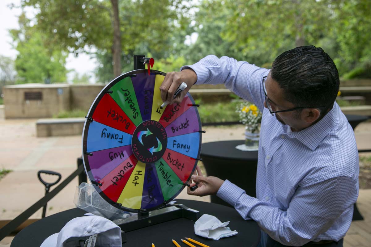 Students celebrate making deans list at event.