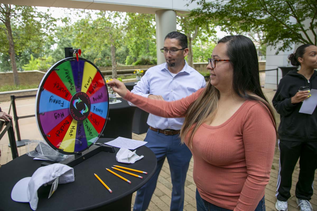 Students celebrate making deans list at event.