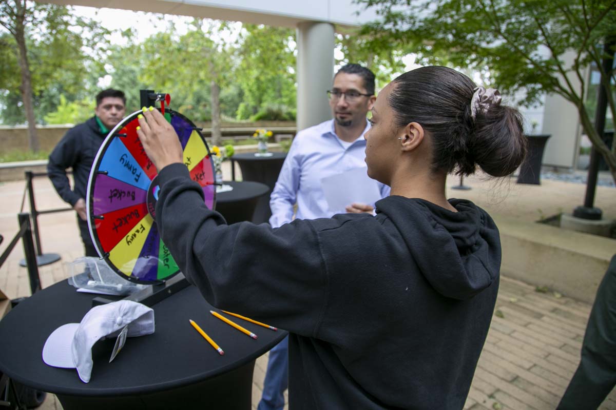 Students celebrate making deans list at event.