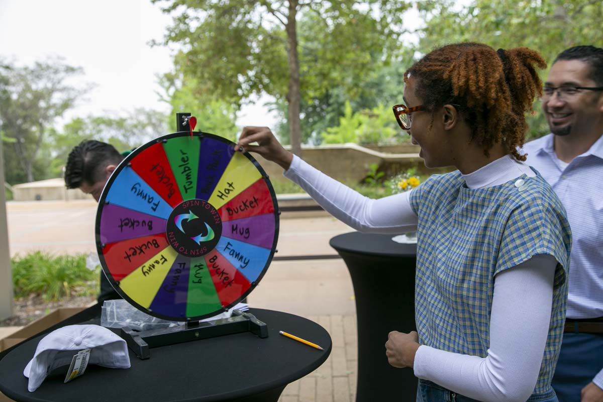 Students celebrate making deans list at event.