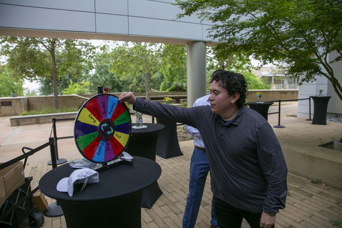 Students celebrate making deans list at event.