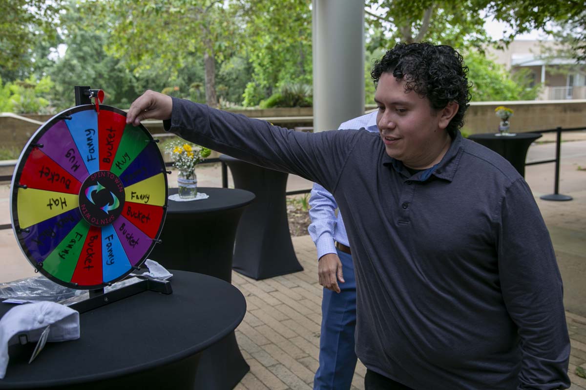 Students celebrate making deans list at event.