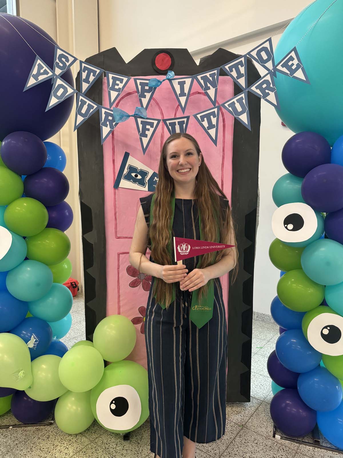 Students attend Transfer Dinner celebration with mascot Ryker.