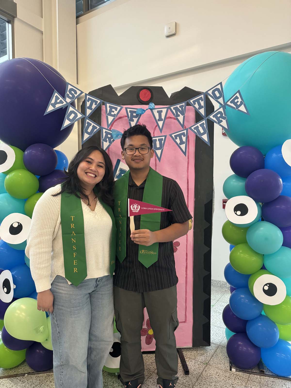 Students attend Transfer Dinner celebration with mascot Ryker.