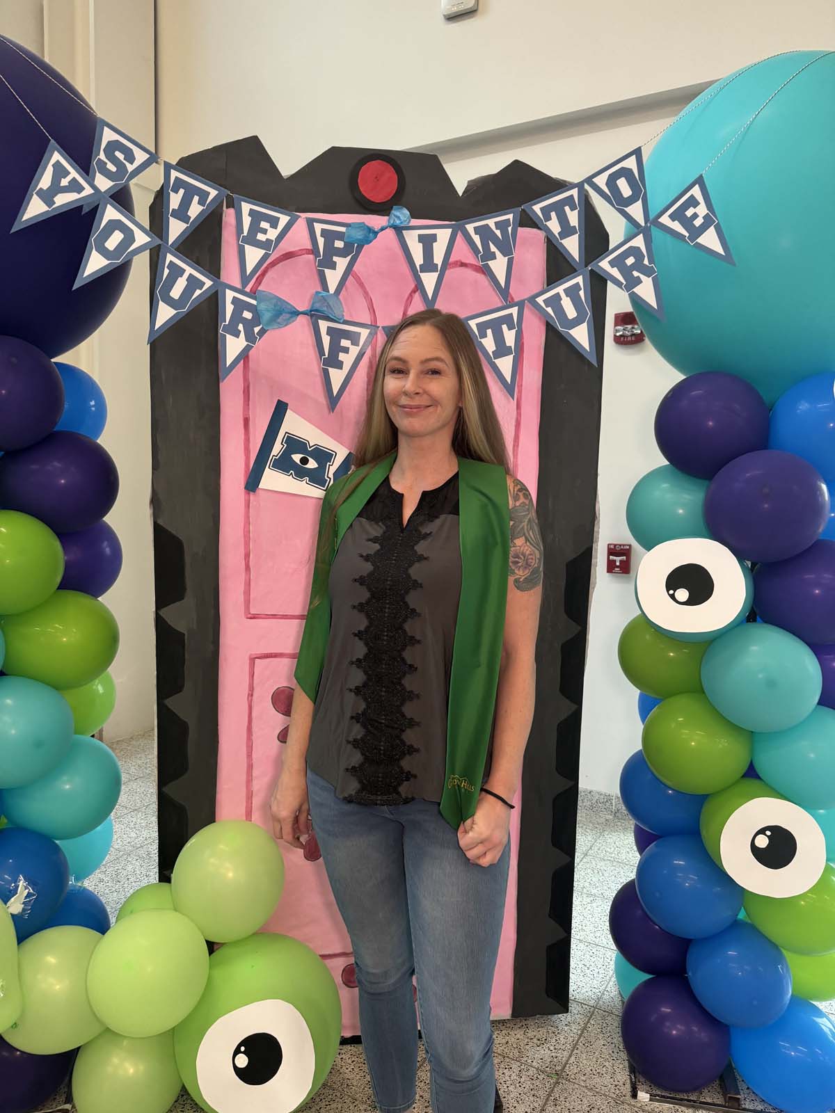 Students attend Transfer Dinner celebration with mascot Ryker.