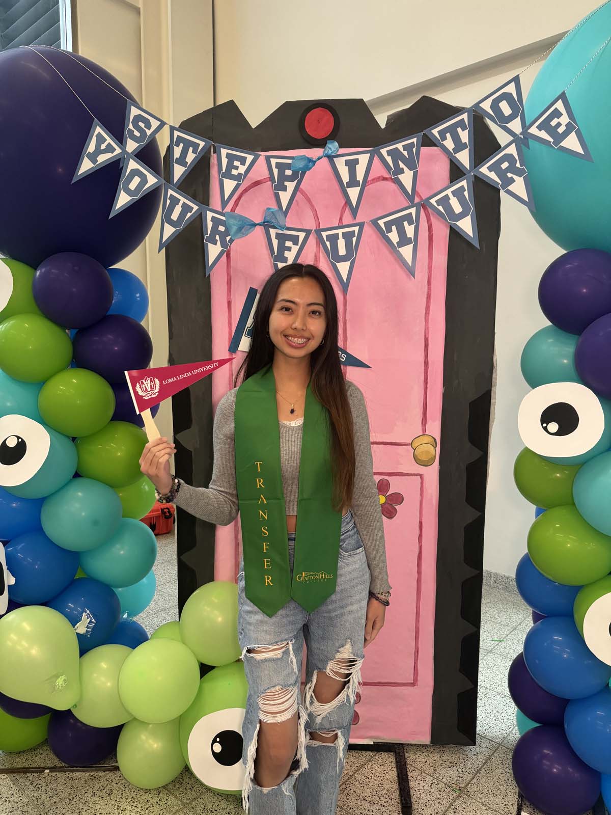 Students attend Transfer Dinner celebration with mascot Ryker.