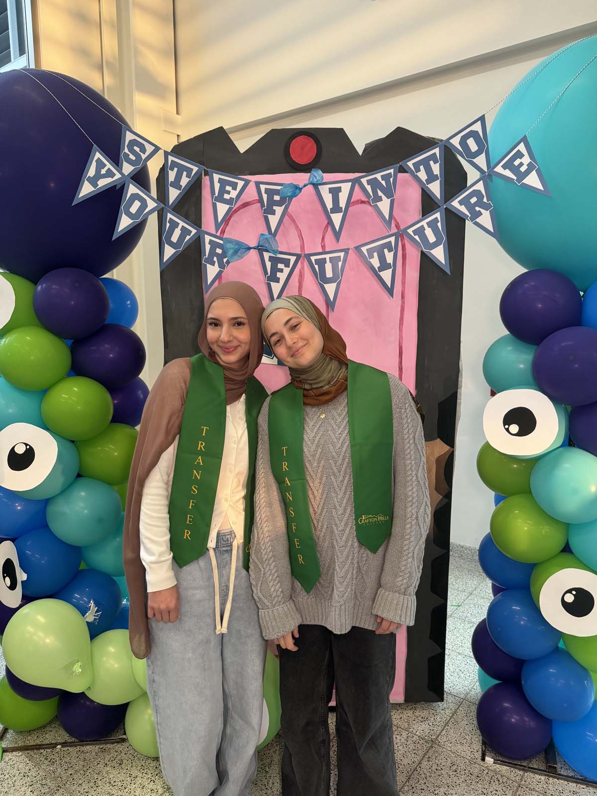 Students attend Transfer Dinner celebration with mascot Ryker.