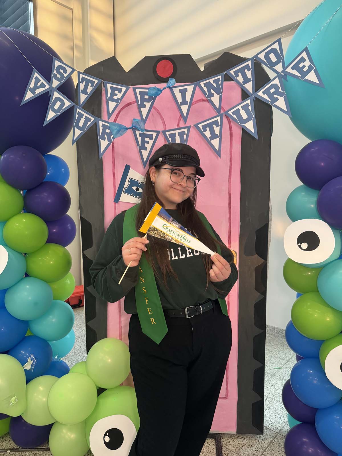 Students attend Transfer Dinner celebration with mascot Ryker.