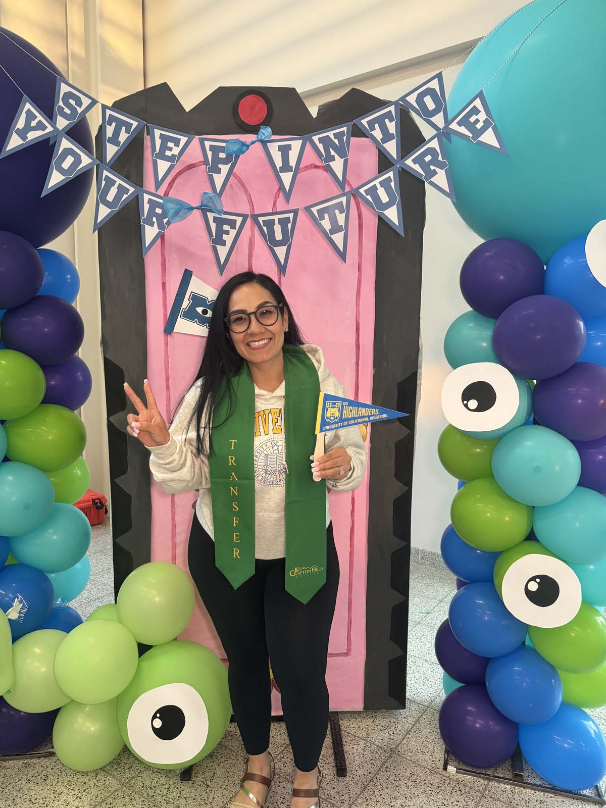 Students attend Transfer Dinner celebration with mascot Ryker.