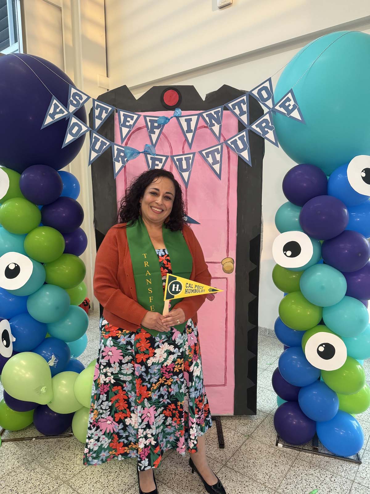 Students attend Transfer Dinner celebration with mascot Ryker.