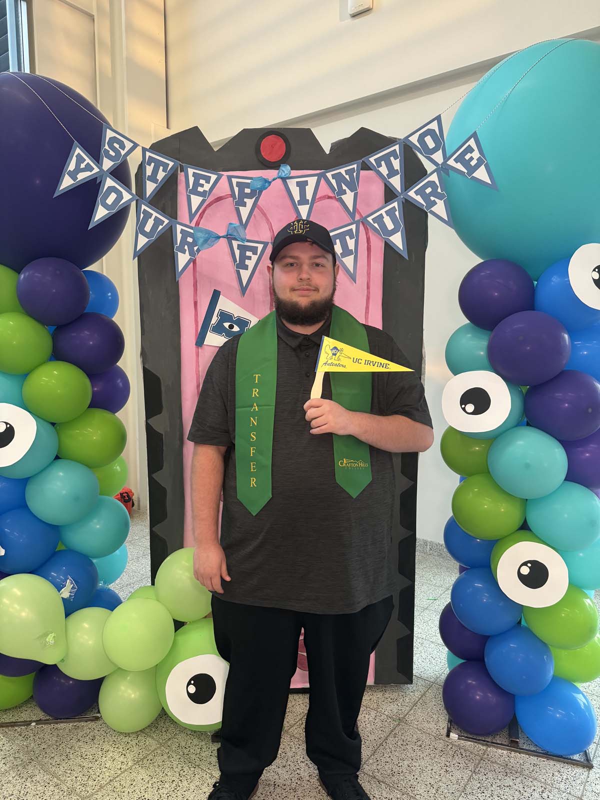 Students attend Transfer Dinner celebration with mascot Ryker.