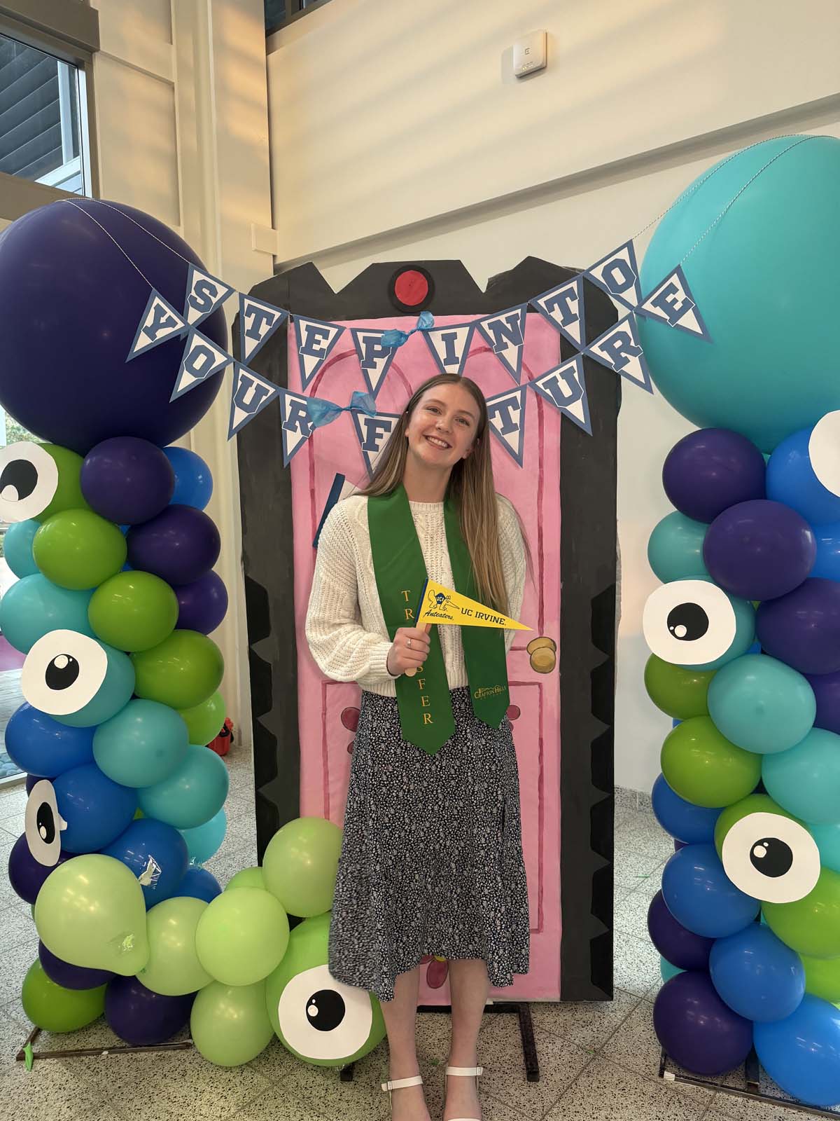 Students attend Transfer Dinner celebration with mascot Ryker.