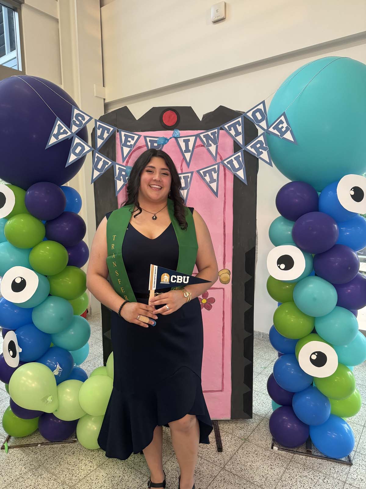 Students attend Transfer Dinner celebration with mascot Ryker.