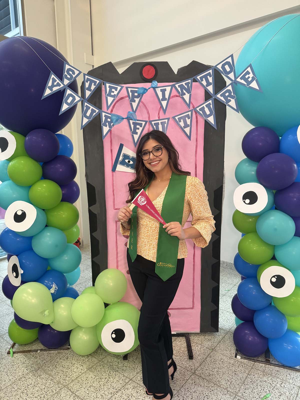 Students attend Transfer Dinner celebration with mascot Ryker.