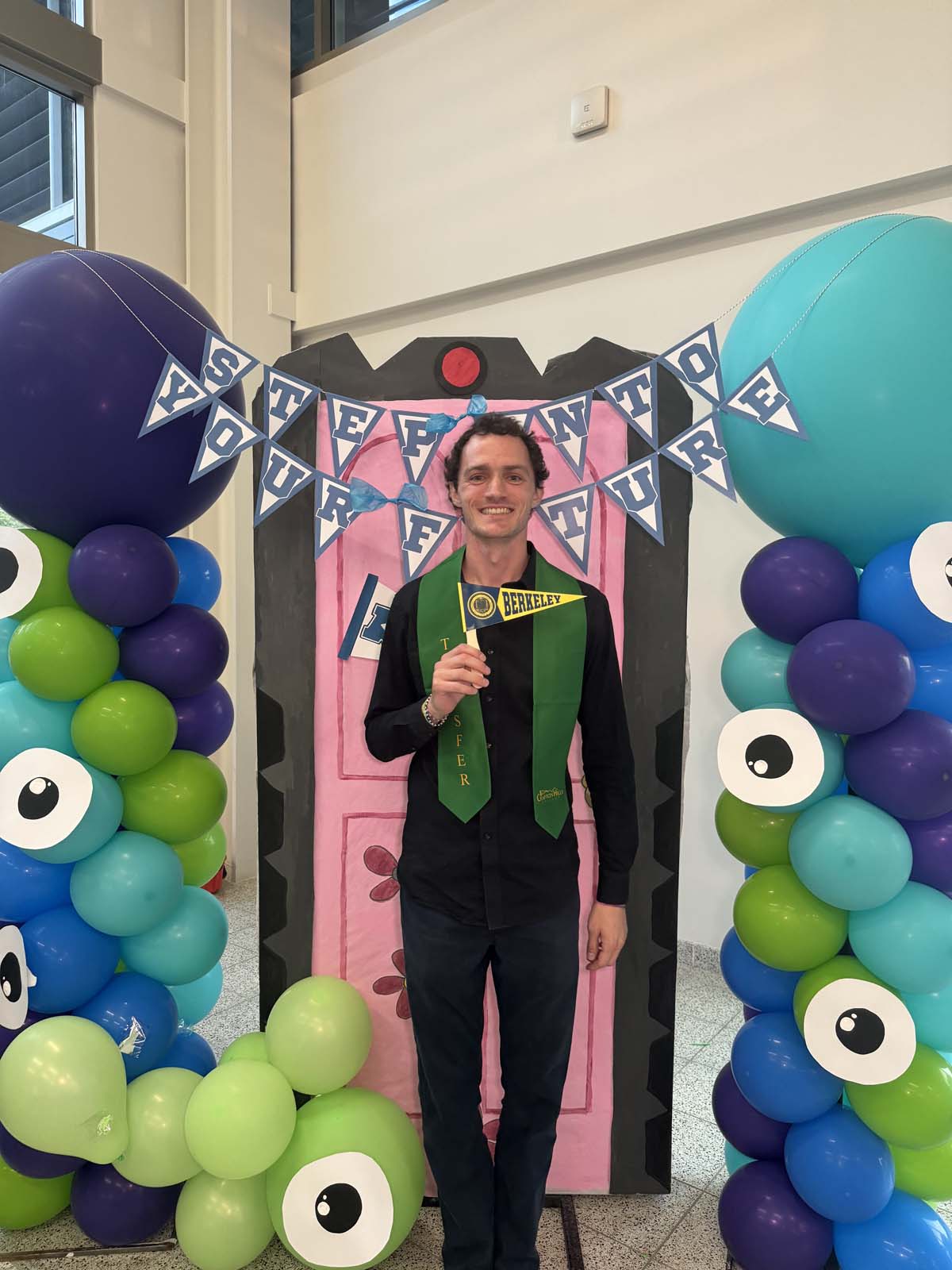 Students attend Transfer Dinner celebration with mascot Ryker.