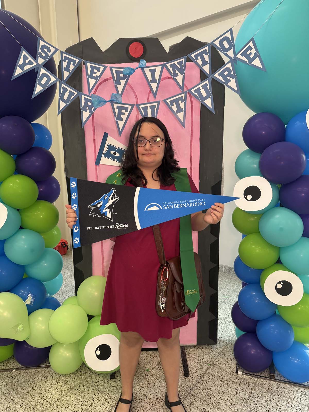 Students attend Transfer Dinner celebration with mascot Ryker.