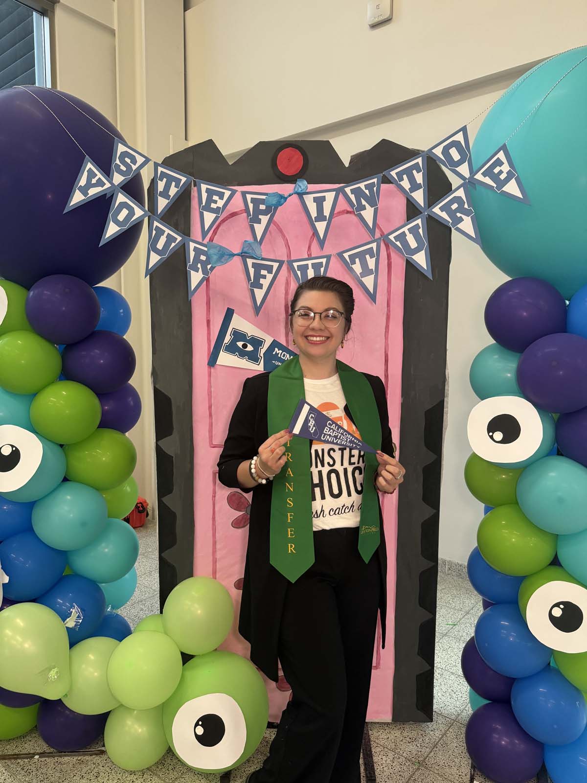 Students attend Transfer Dinner celebration with mascot Ryker.