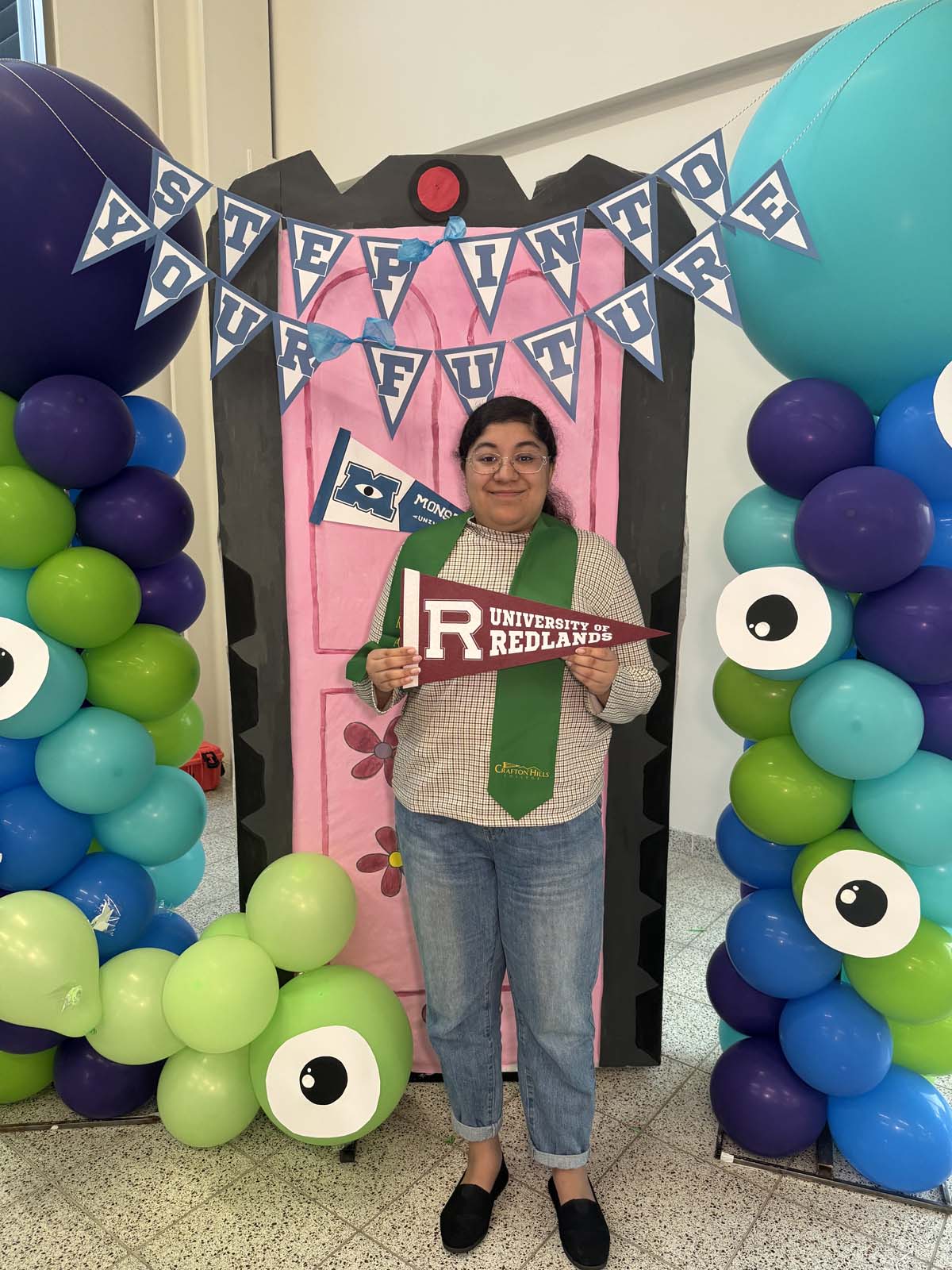 Students attend Transfer Dinner celebration with mascot Ryker.