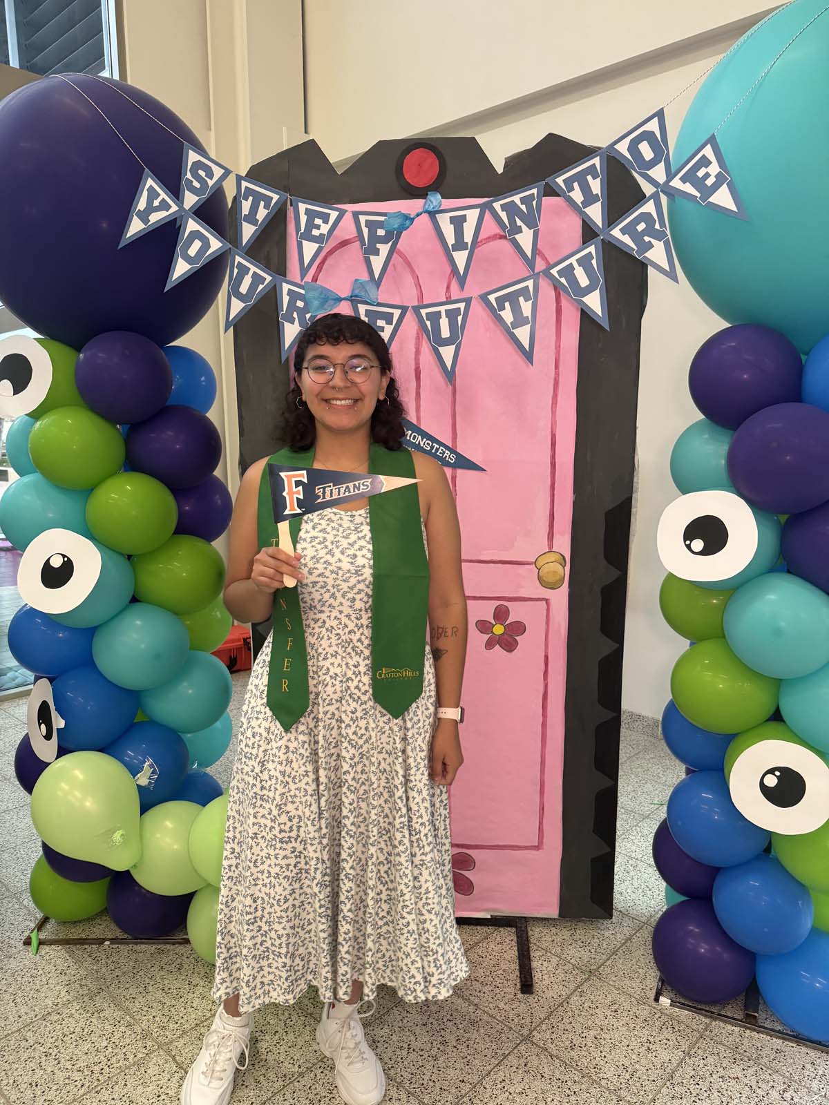 Students attend Transfer Dinner celebration with mascot Ryker.